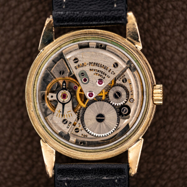 Girard Perregaux Sea Hawk B-1801 open manual movement showing signed bridge, visible gears and balance