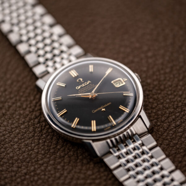 Omega Constellation 168.010 oblique front view with pointed hands, applied star and multirow bracelet