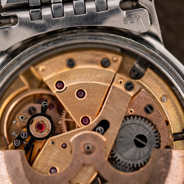 Omega Constellation 168.010 movement detail featuring caliber marking, serial engraving and visible balance assembly
