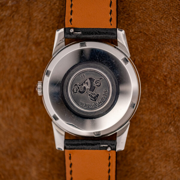 Caseback of the Omega Seamaster 14761 with the Seamaster seahorse medallion and the strap underside