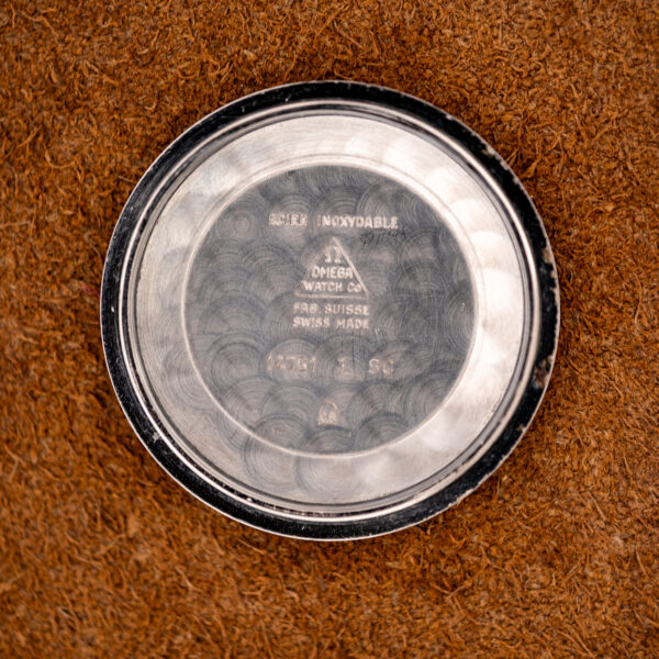 Inside of the Omega Seamaster caseback stamped with Omega marks, Acier Inoxydable and reference 14761 1 SC
