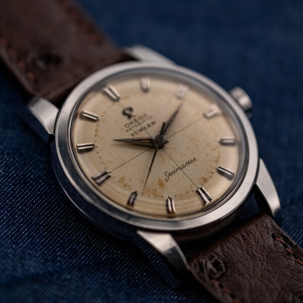 Oblique lower-dial view of the Omega 2846-15 SC with Seamaster lettering and the steel bezel