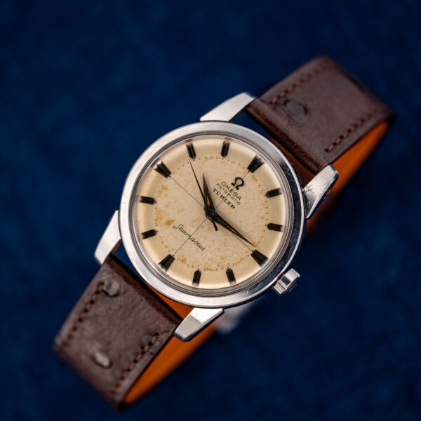 Three-quarter view of the Omega Seamaster 2846-15 SC showing the Türler dial, crown and brown strap
