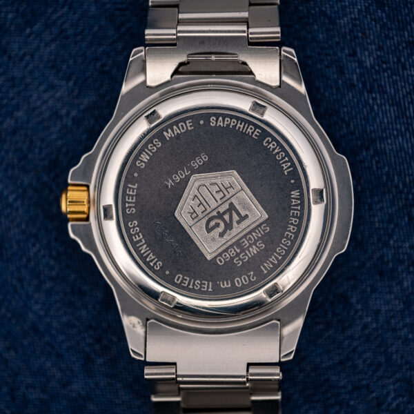 Caseback of the TAG Heuer 995.706 K with reference number, Since 1860, sapphire crystal and 200 m inscriptions