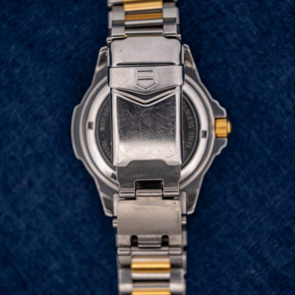 TAG Heuer 995.706 K clasp opened to show the folding extension and its bracelet connection