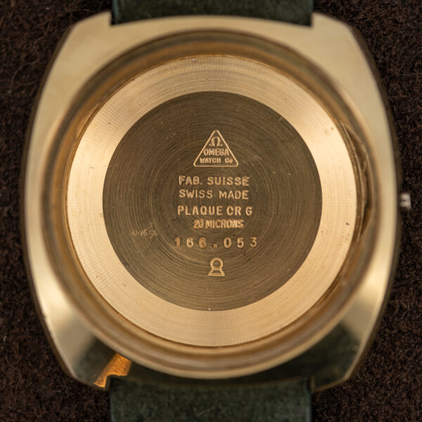 Inside the Omega 166.053 case with reference number, Fab. Suisse and Plaque Or G 20 Microns stamps