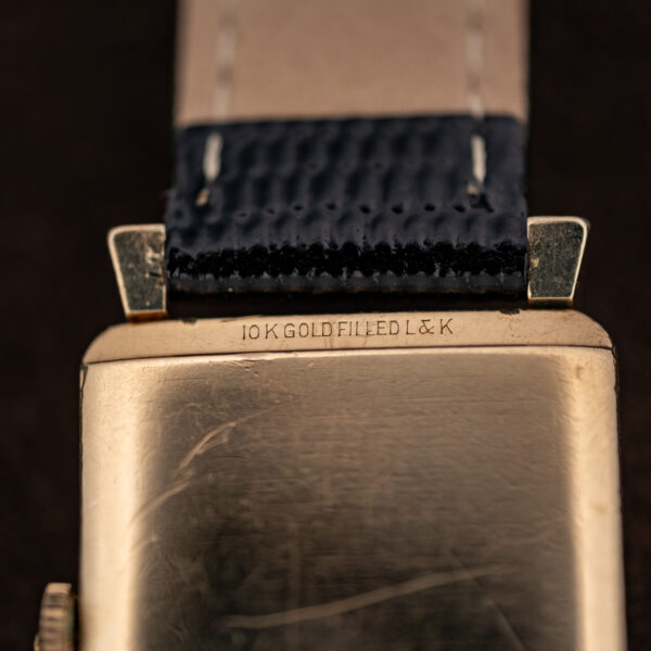 Macro of the Wittnauer Revue caseback stamped 10 K GOLDFILLED L & K along the upper lip
