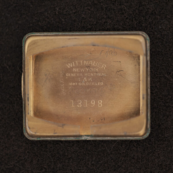 Inner caseback of the Wittnauer Revue stamped with New York, Geneva and Montreal, L & K and 13198