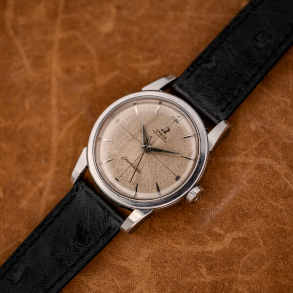 Wide front view of the Omega Seamaster 2846-1 SC with its black textured ostrich strap