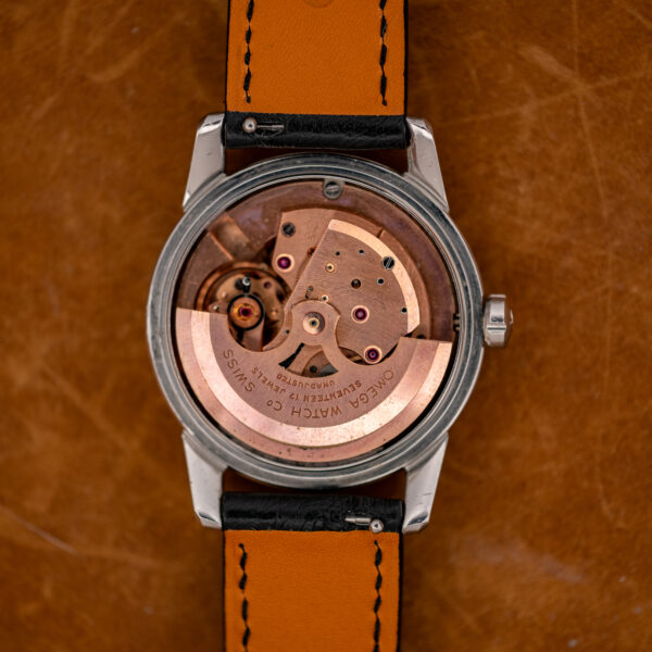 Omega caliber 500 automatic movement in the open case, rotor marked Seventeen 17 Jewels