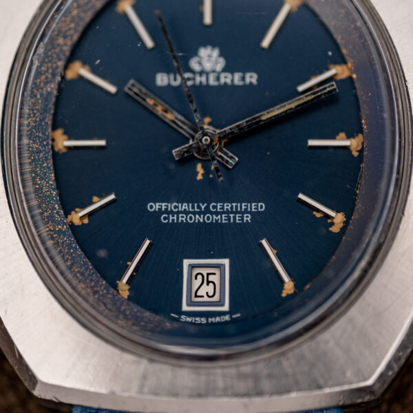 Lower dial of the Bucherer 1574 with Officially Certified Chronometer text, date window and Swiss Made