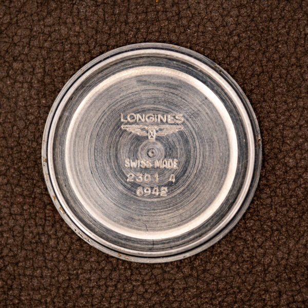 Inner caseback of the Longines Admiral HF stamped with the winged hourglass, 2301 4 reference and 6942