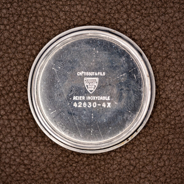 Inner caseback of the Tissot PR 516 stamped CHs TISSOT & FILS, ACIER INOXYDABLE and 42630-4X