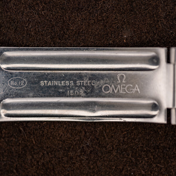 Inside the Omega folding clasp, stamped 1502, STAINLESS STEEL, No 12 and OMEGA