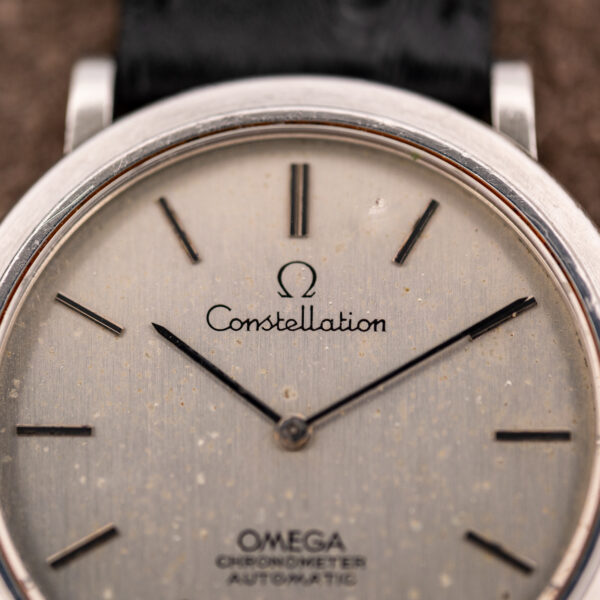 Upper dial of the Omega Constellation 157.0001 showing the Constellation script, Omega symbol and doubled twelve marker