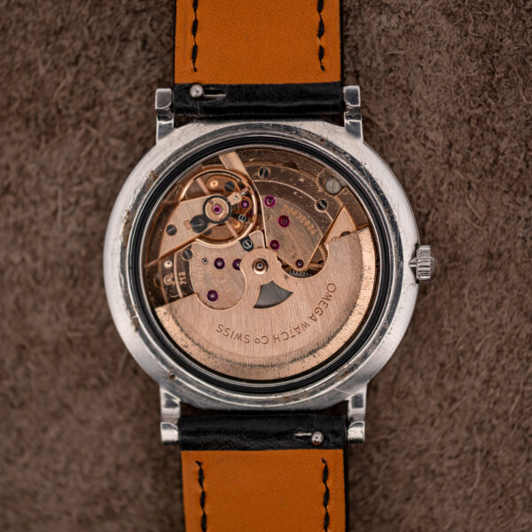Open back of the Omega Constellation 157.0001 showing the signed automatic rotor and caliber 712 movement