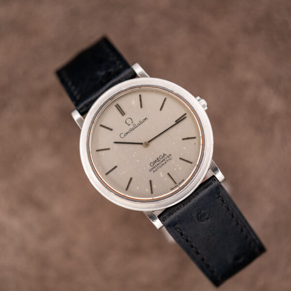 Alternate front view of the Omega Constellation 157.0001 on a stand, silver dial with applied baton markers