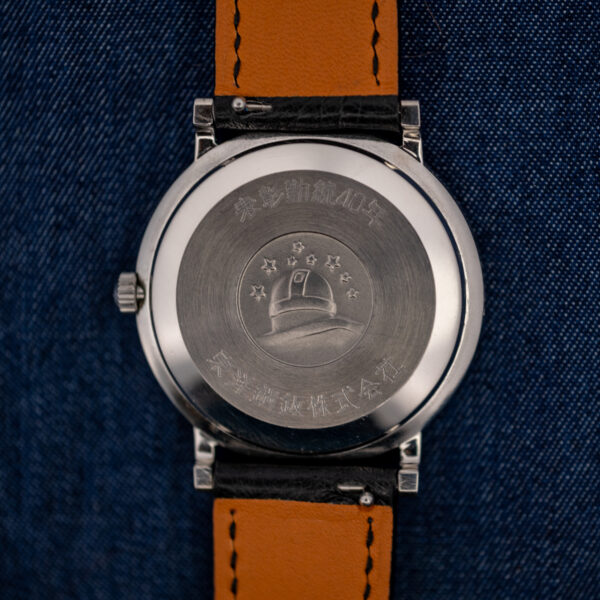 Omega Constellation caseback with observatory medallion and a Japanese 40-year long-service engraving around it