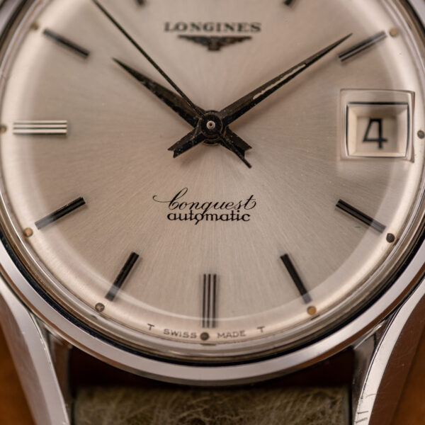 Lower dial of the Longines Conquest 7171-2 with Conquest and automatic script above T SWISS MADE T