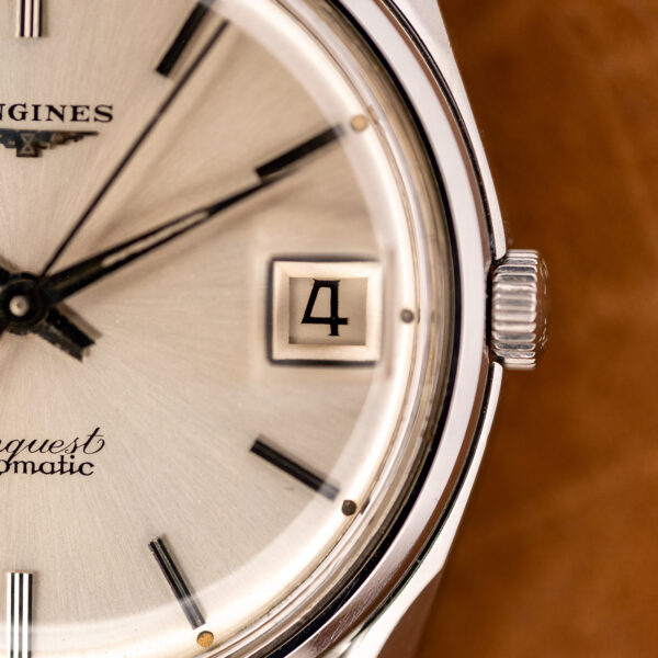 Macro of the date window and signed crown on the Longines Conquest 7171-2