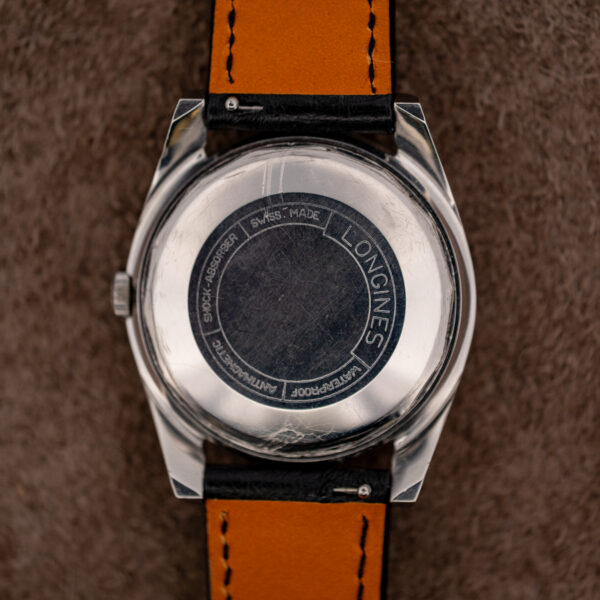 Outer caseback of the Longines Conquest 7171-5 with its ring of engraved words and strap undersides