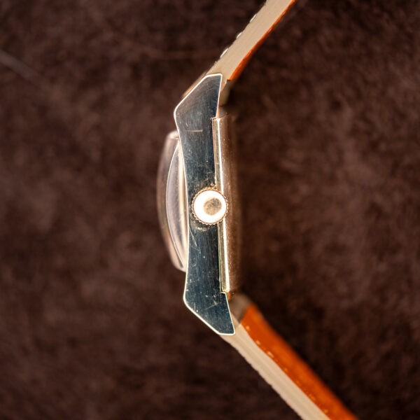 Crown-side profile of the Longines 2172-10 showing the curved case and raised rectangular crystal