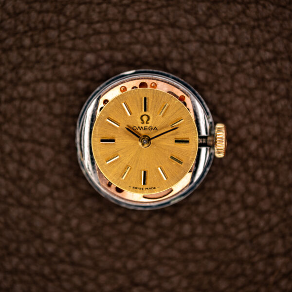 Uncased Omega ladies dial with Omega signature, applied baton markers and Swiss Made text
