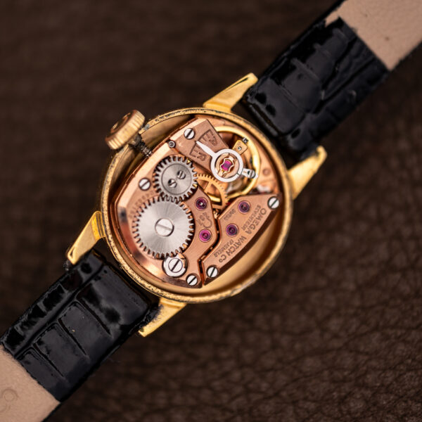 Angled view of the Omega 484 movement showing the caliber stamp and 17 Jewels bridge inscription